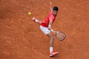 Novak Djokovic of Serbia returns the ball to Cameron Norrie of Britain at the Italian Open tennis tournament, in Rome, Tuesday, May 16, 2023. (AP Photo/Andrew Medichini)