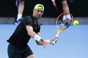 Spain's Rafael Nadal plays a forehand return during a practice session on Rod Laver Arena ahead of the Australian Open tennis championship in Melbourne, Australia, Thursday, Jan. 12, 2023. (AP Photo/Mark Baker)