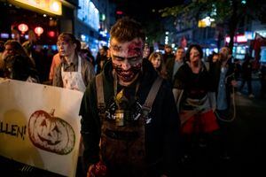 31 October 2019, North Rhine-Westphalia, Essen: On Thursday, numerous people dressed as zombies will be strolling through downtown Essen as participants in a demonstration. The "Zombie Walk", which had been taking place on Halloween evening for several years, had been the subject of a fierce dispute, because the city's marketing company fears that visitors to a simultaneous light festival in the city might be disturbed. Instead of the zombie walk, there is now a demonstration announced by the Left and Greens for more participation of the residents in the urban design Photo: Fabian Strauch/dpa (Photo by Fabian Strauch/picture alliance via Getty Images)