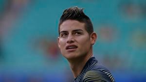 Colombia's James Rodriguez looks on as he warms up before the Copa America football tournament group match against Paraguay at the Fonte Nova Arena in Salvador, Brazil, on June 23, 2019. (Photo by Juan MABROMATA / AFP)