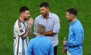 Soccer Football - FIFA World Cup Qatar 2022 - Quarter Final - Netherlands v Argentina - Lusail Stadium, Lusail, Qatar - December 10, 2022 Argentina's Lionel Messi celebrates with former Argentina player Sergio Aguero after the penalty shootout as Argentina progress to the semi finals REUTERS/Paul Childs