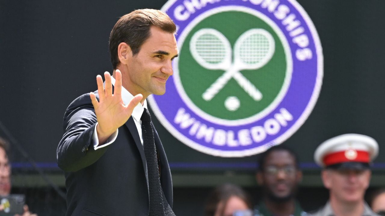 LONDON, ENGLAND - JULY 03: Roger Federer of Switzerland acknowledges spectators at the Centre Court Centenary Celebration on day seven of the Wimbledon Tennis Championships at the All England Lawn Tennis and Croquet Club on July 03, 2022 in London, England. (Photo by Getty Images/Karwai Tang/WireImage)