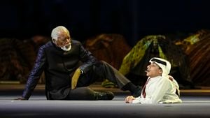 US actor Morgan Freeman, left, sits on the stage at the opening ceremony prior he World Cup, group A soccer match between Qatar and Ecuador at the Al Bayt Stadium in Al Khor, Sunday, Nov. 20, 2022. (AP Photo/Natacha Pisarenko)