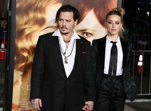 WESTWOOD, CA - NOVEMBER 21: Amber Heard and Johnny Depp attend the premiere of Focus Features' 'The Danish Girl' on November 21, 2015 in Westwood, California. (Photo by JB Lacroix/Getty Images)