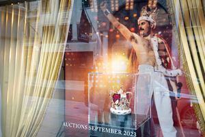 Coinciding with the coronation of King Charles III, the crown worn by pop star Freddie Mercury of the band 'Queen', is displayed in the window of Bond Street auction house, Christies whose auction of Mercury's personal effects takes place in September, on 2nd May 2023, in London, England. More than 1,500 lots, including original lyrics and Victorian paintings, from the rockstar's London home will be sold by Mercury's former girlfriend and close friend, Mary Austin. (Photo by Richard Baker / In Pictures via Getty Images)