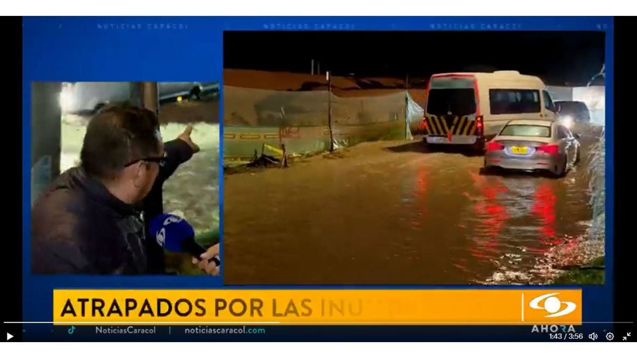 Periodista de 'Noticias Caracol' tuvo que ayudar, en vivo, a conductor de carro de lujo que quedó atrapado por inundación