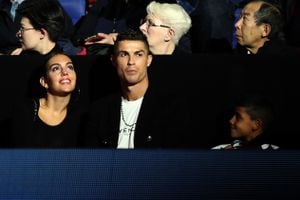 LONDON, ENGLAND - NOVEMBER 12:  Cristiano Ronaldo, his girlfriend Georgina Rodríguez and son Cristiano Ronaldo Jr. watch on during the singles round robin match between Novak Djokovic of Serbia and John Isner of The United States during Day Two of the Nitto ATP Finals at The O2 Arena on November 12, 2018 in London, England.  (Photo by Julian Finney/Getty Images)
