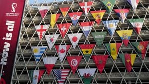 Banderas de las selecciones clasificadas al Mundial de Qatar 2022 muy cerca a la Torre Al Bidda en la ciudad de Doha.
