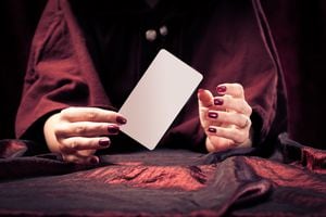 fortune teller with with blank tarot card - easily add your own message or design.
