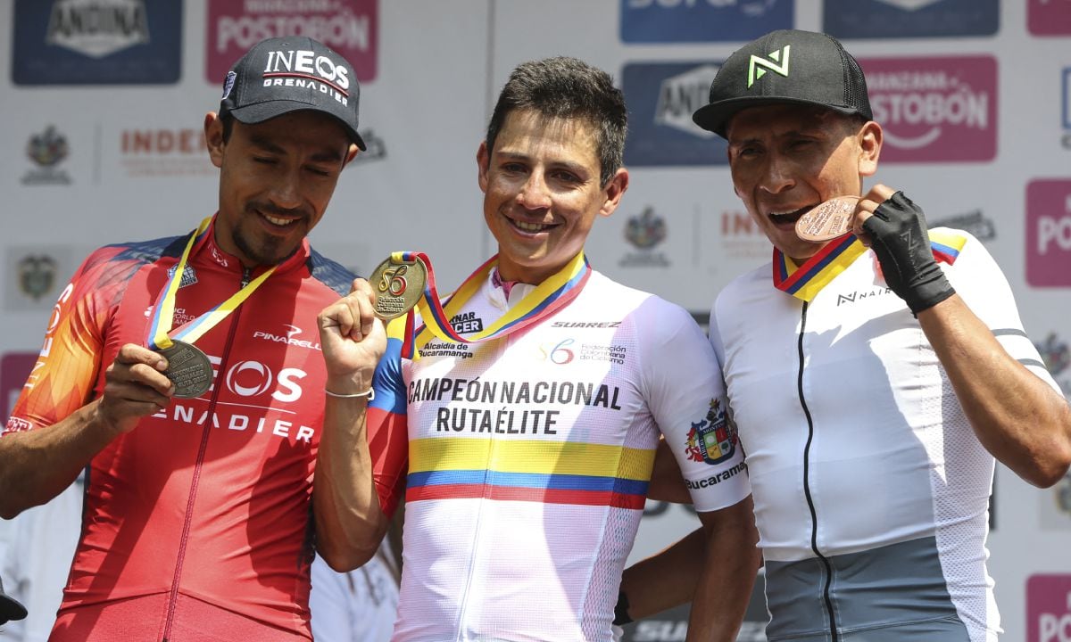 Colombian cyclists (L to R) Daniel Felipe Martinez, Esteban Chavez, and Nairo Quintana celebrate at the podium of the Ruta de Colombia championship in Bucaramanga, Colombia on February 5, 2023.
AFP/Jaime MORENO VARGAS