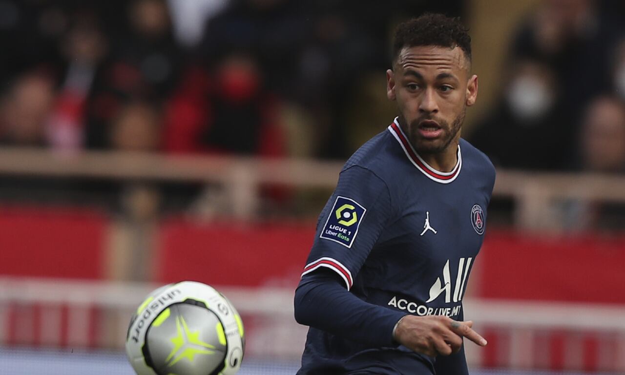 PSG's Neymar eyes the ball during the French League One soccer match between Monaco and Paris Saint-Germain at the Stade Louis II in Monaco, Sunday, March 20, 2022. (AP/Daniel Cole)