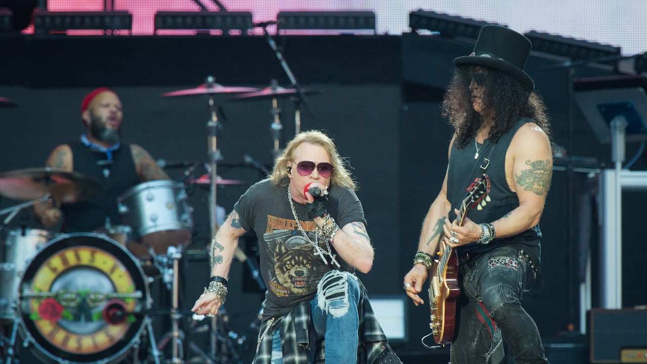 Axl Rose and Slash from Guns N' Roses perform  at Stade de France on July 7, 2017 in Paris, France.  (Photo by David Wolff - Patrick/Redferns)