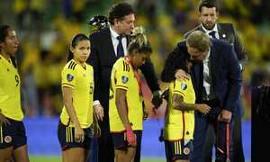Colombia's players line up to receive the second place medal during the award ceremony of the women's Copa America soccer tournament in Bucaramanga, Colombia , Saturday, July 30, 2022. Colombia lost to Brazil 0-1. (AP Photo/Fernando Vergara)