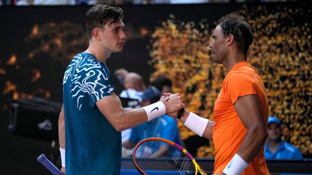 Rafael Nadal, right, of Spain is congratulated by Jack Draper of Britain following their first round match at the Australian Open tennis championship in Melbourne, Australia, Monday, Jan. 16, 2023. (AP Photo/Aaron Favila)