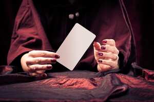 fortune teller with with blank tarot card - easily add your own message or design.