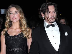 (L-R) Actress Amber Heard and actor Johnny Depp arrive at the 27th Annual Palm Springs International Film Festival at Palm Springs Convention Center on January 02, 2016 in Palm Springs, California. (Photo by Barry King/Getty Images)