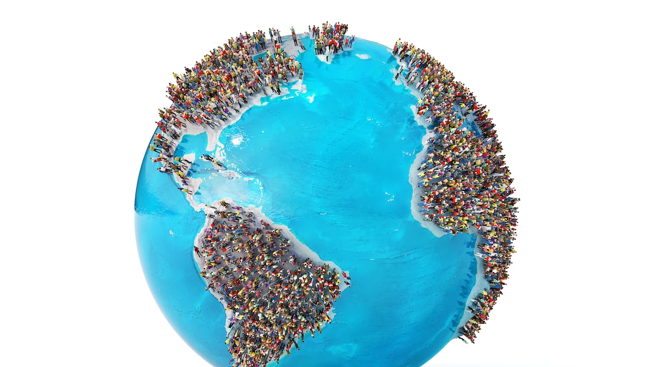 The problem of overpopulation. Earth full of people on a white background. 3d illustration