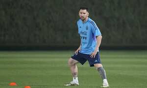 Lionel Messi looks on during a training session of Argentina's national soccer team in Doha, Saturday, Nov. 19, 2022. (AP Photo/Jorge Saenz)