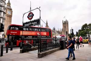 LONDON, ENGLAND - AUGUST 24: General view of People walk near Westminster tube station at Parliament Square Garden on August 24, 2023 in London, England. (Photo by Stefano Guidi/Getty Images)