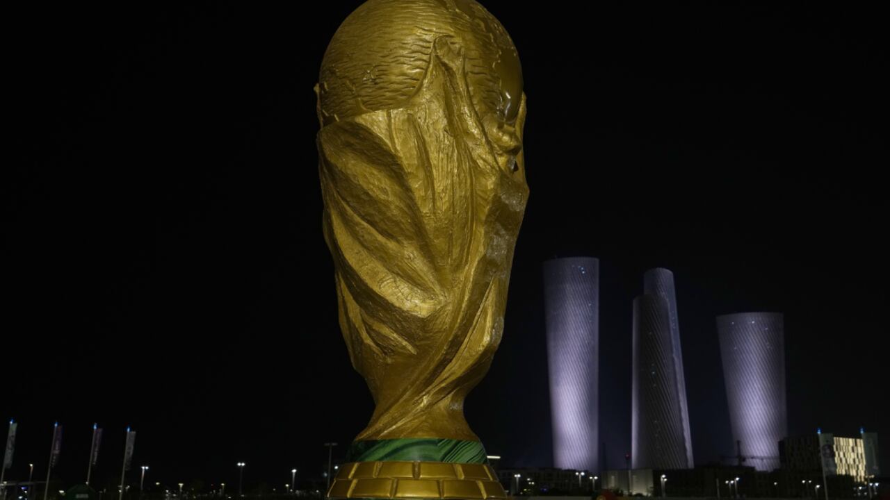 A replica of the World Cup is display outside Lusail Stadium in Lusail in Doha, Qatar, Saturday, Nov. 12, 2022. Final preparations are being made for the soccer World Cup which starts on Nov. 20 when Qatar face Ecuador. (AP/Hassan Ammar)
