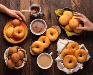 Traditional Colombian breakfast - Buñuelo, pandequeso, almojabana, coffee and chocolate