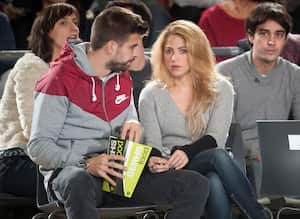 BARCELONA, SPAIN - NOVEMBER 29:  Gerard Pique, FC Barcelona soccer player and his partner singer Shakira attend the 2013-2014 Turkish Airlines Euroleague Regular Season Date 7 game between FC Barcelona Regal v Fenerbahce Ulker Istanbul at Palau Blaugrana on November 29, 2013 in Barcelona, Spain.  (Photo by Rodolfo Molina/Euroleague Basketball via Getty Images)