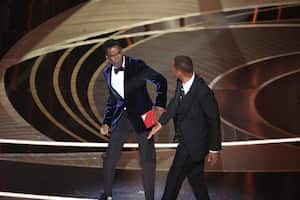 HOLLYWOOD, CA - March 27, 2022. Chris Rock and Will Smith onstage during the show at the 94th Academy Awards at the Dolby Theatre at Ovation Hollywood on Sunday, March 27, 2022. (Myung Chun / Los Angeles Times via Getty Images)