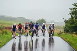 GLASGOW, SCOTLAND - AUGUST 12: Antoine Huby of France, Lorenzo Milesi of Italy, Axel Laurance of France, Jack Rootkin-Gray of The United Kingdom, Trym Brennsæter of Norway, Brody Mcdonald of The United States, Moritz Kretschy of Germany and Alastair Mackellar of Australia compete in the breakaway during the Men Under 23 Road Race a 168.4km race from Loch Lomond to Glasgow at the 96th UCI Cycling World Championships Glasgow 2023, Day 10 / #UCIWT / on August 12, 2023 in Glasgow, Scotland. (Photo by Zac Williams - Pool/Getty Images)