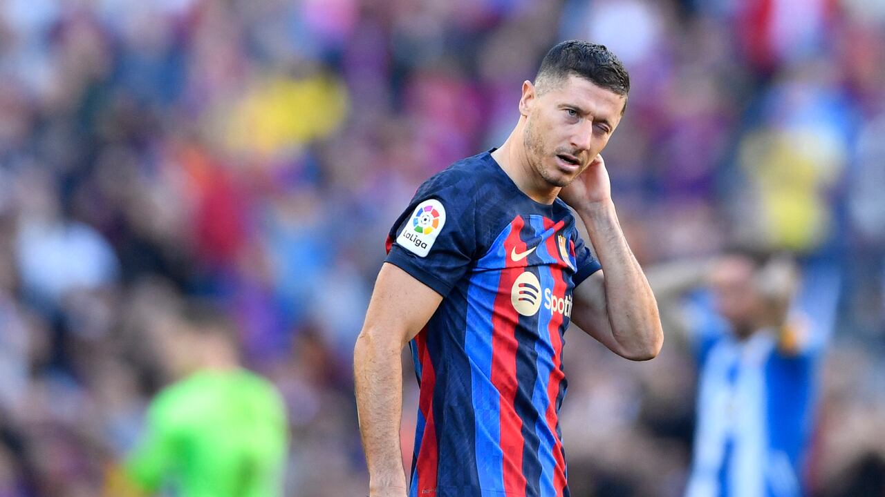 Barcelona's Polish forward Robert Lewandowski reacts during the Spanish League football match between FC Barcelona and RCD Espanyol at the Camp Nou stadium in Barcelona on December 31, 2022. (Photo by Pau BARRENA / AFP)