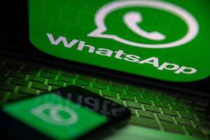 TURKEY - 2022/10/25: In this photo illustration, a WhatsApp logo seen displayed on a smartphone screen and on a laptop. (Photo Illustration by Onur Dogman/SOPA Images/LightRocket via Getty Images)