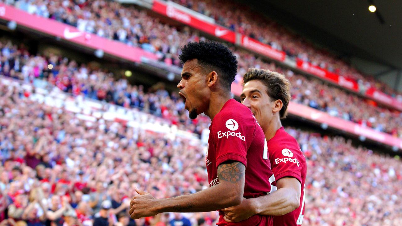 Liverpool's Luis Diaz celebrates scoring their side's ninth goal of the game during the English Premier League match between Liverpool and Bournemouth at Anfield stadium in Liverpool, England, Saturday Aug. 27, 2022. (Peter Byrne/PA via AP)