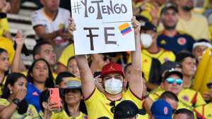 BARRANQUILLA, COLOMBIA - MARCH 24: A fan of Colombia holds a sign that reads 'I have faith' prior to a match between Colombia and Bolivia as part of FIFA World Cup Qatar 2022 Qualifier on March 24, 2022 in Barranquilla, Colombia. (Photo by Gabriel Aponte/Getty Images)