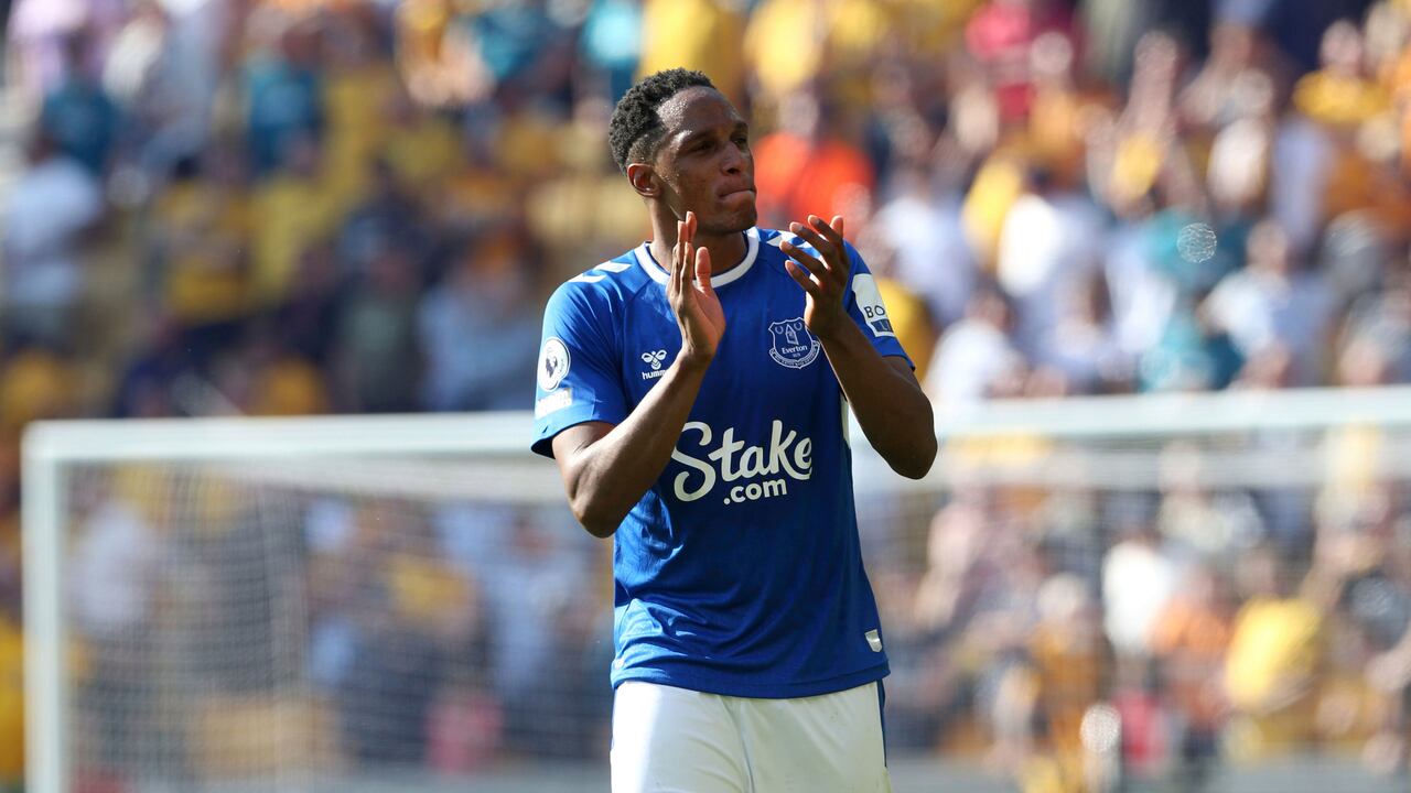 Everton's Yerry Mina applauds the fans after the English Premier League soccer match between Wolverhampton Wanderers and Everton at the Molineux Stadium, Wolverhampton, Saturday May 20, 2023. (Barrington Coombs/PA via AP)