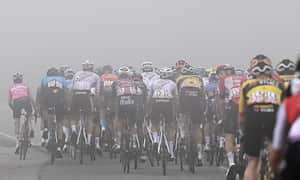 Athletes pedal through a thick fog during the 198 kilometer-7th stage of the cycling Giro D'Italia from Diamante to Potenza in southern Italy, Friday, May 13, 2022. (Fabio Ferrari/LaPresse via AP)