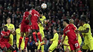 LIVERPOOL, ENGLAND - APRIL 27: Sadio Mané of Liverpool competes for the ball with Raul Albiol of Villarreal CF during the UEFA Champions League Semi Final Leg One match between Liverpool and Villarreal at Anfield on April 27, 2022 in Liverpool, England. (Photo by David Ramos/Getty Images)