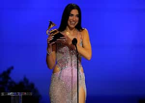 Dua Lipa accepts the award for best pop vocal album for "Future Nostalgia" at the 63rd annual Grammy Awards at the Los Angeles Convention Center on Sunday, March 14, 2021. (AP Photo/Chris Pizzello)