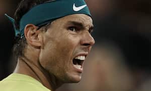 Spain's Rafael Nadal reacts after missing a point as he plays Serbia's Novak Djokovic during their quarterfinal match of the French Open tennis tournament at the Roland Garros stadium Tuesday, May 31, 2022 in Paris. (AP Photo/Thibault Camus)