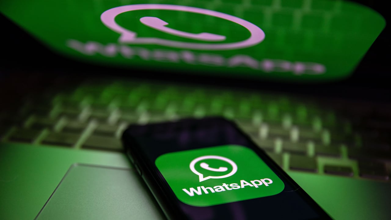 TURKEY - 2022/10/25: In this photo illustration, a WhatsApp logo seen displayed on a smartphone screen and on a laptop. (Photo Illustration by Onur Dogman/SOPA Images/LightRocket via Getty Images)