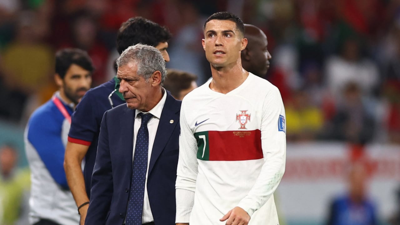 Soccer Football - FIFA World Cup Qatar 2022 - Group H - South Korea v Portugal - Education City Stadium, Al Rayyan, Qatar - December 2, 2022 Portugal's Cristiano Ronaldo with coach Fernando Santos after being substituted REUTERS/Matthew Childs