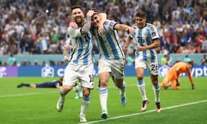 Soccer Football - FIFA World Cup Qatar 2022 - Semi Final - Argentina v Croatia - Lusail Stadium, Lusail, Qatar - December 13, 2022 Argentina's Julian Alvarez celebrates scoring their second goal with Lionel Messi and Nahuel Molina REUTERS/Carl Recine