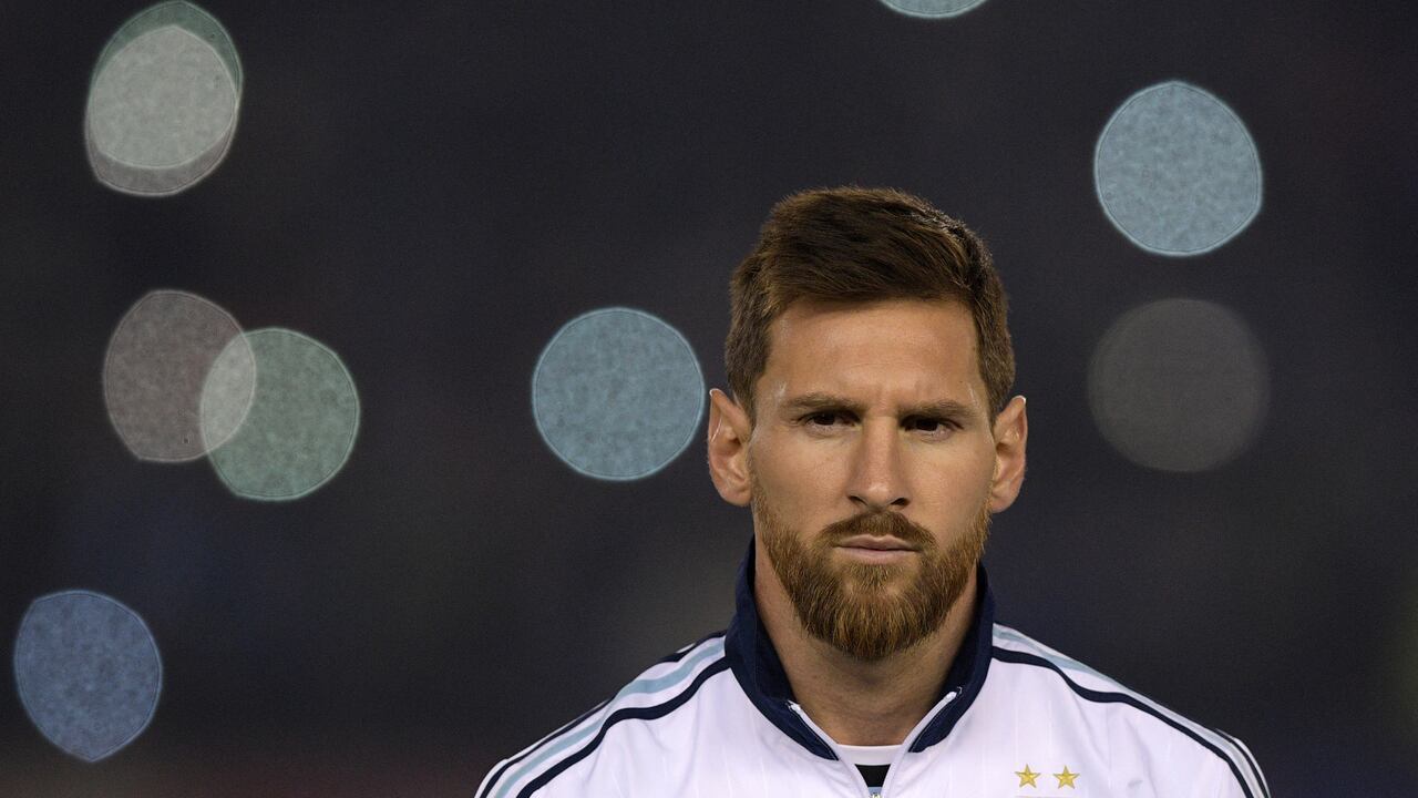 FILES) In this file photo taken on September 05, 2017 Argentina's Lionel Messi listens to the national anthems before the start of the 2018 World Cup qualifying football match between Argentina and Venezuela in Buenos Aires. - Argentina captain Lionel Messi said that the 2022 World Cup in Qatar will "surely" be the last of his career. (Photo by Juan Mabromata / AFP)