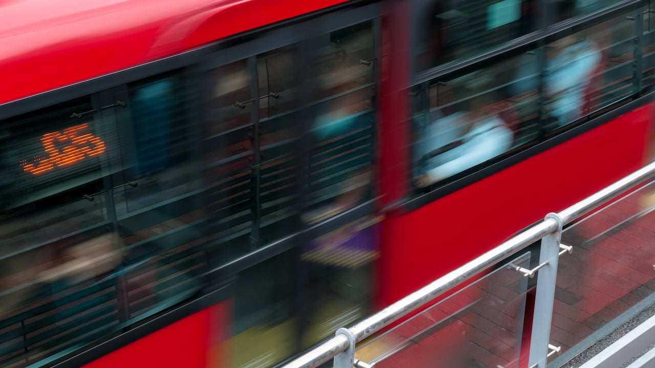 Red public bus in Bogota at fast speeds. Bogota Colombia .