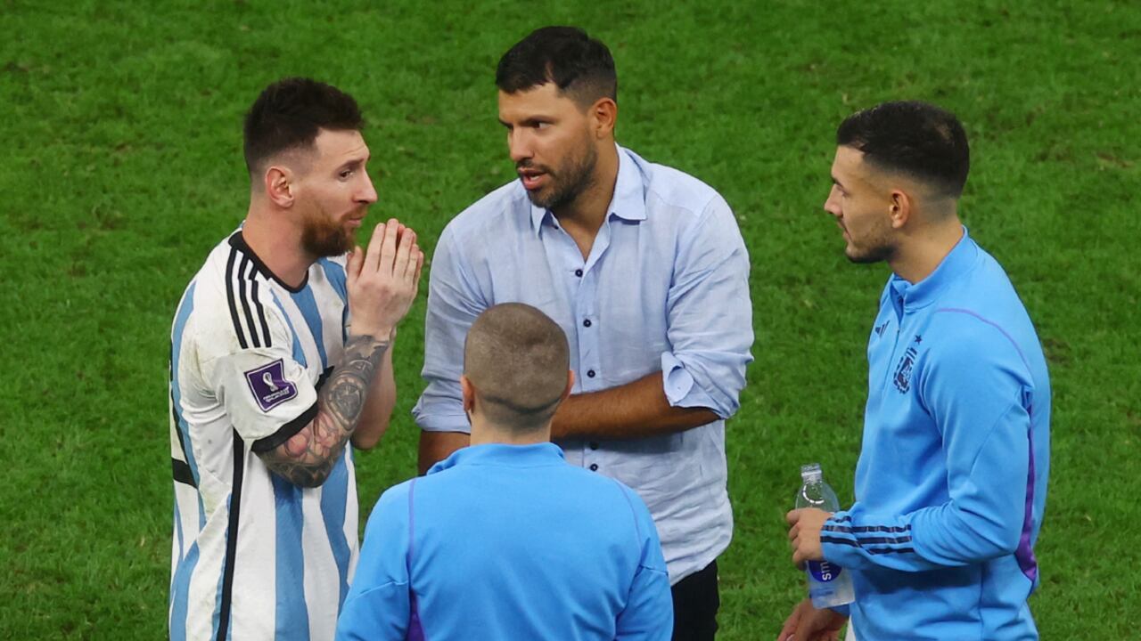 Soccer Football - FIFA World Cup Qatar 2022 - Quarter Final - Netherlands v Argentina - Lusail Stadium, Lusail, Qatar - December 10, 2022 Argentina's Lionel Messi celebrates with former Argentina player Sergio Aguero after the penalty shootout as Argentina progress to the semi finals REUTERS/Paul Childs