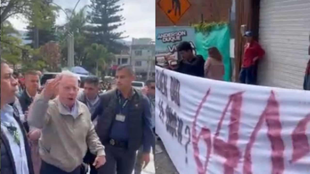 Durante su visita, Uribe se encontró con un grupo de jóvenes que llevaban una pancarta con la inscripción “¿Quién dio la orden 6.402?”