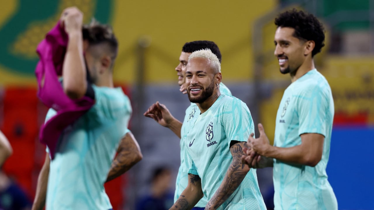 Soccer Football - FIFA World Cup Qatar 2022 - Brazil Training - Al Arabi SC Stadium, Doha, Qatar - December 8, 2022 Brazil's Neymar and Marquinhos during training REUTERS/Lee Smith