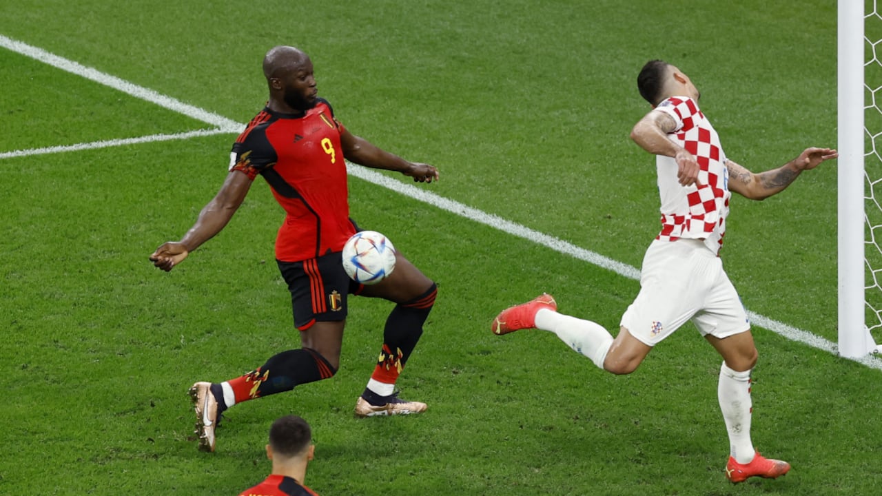 Soccer Football - FIFA World Cup Qatar 2022 - Group F - Croatia v Belgium - Ahmad Bin Ali Stadium, Al Rayyan, Qatar - December 1, 2022 Belgium's Romelu Lukaku in action with Croatia's Dejan Lovren REUTERS/Albert Gea
